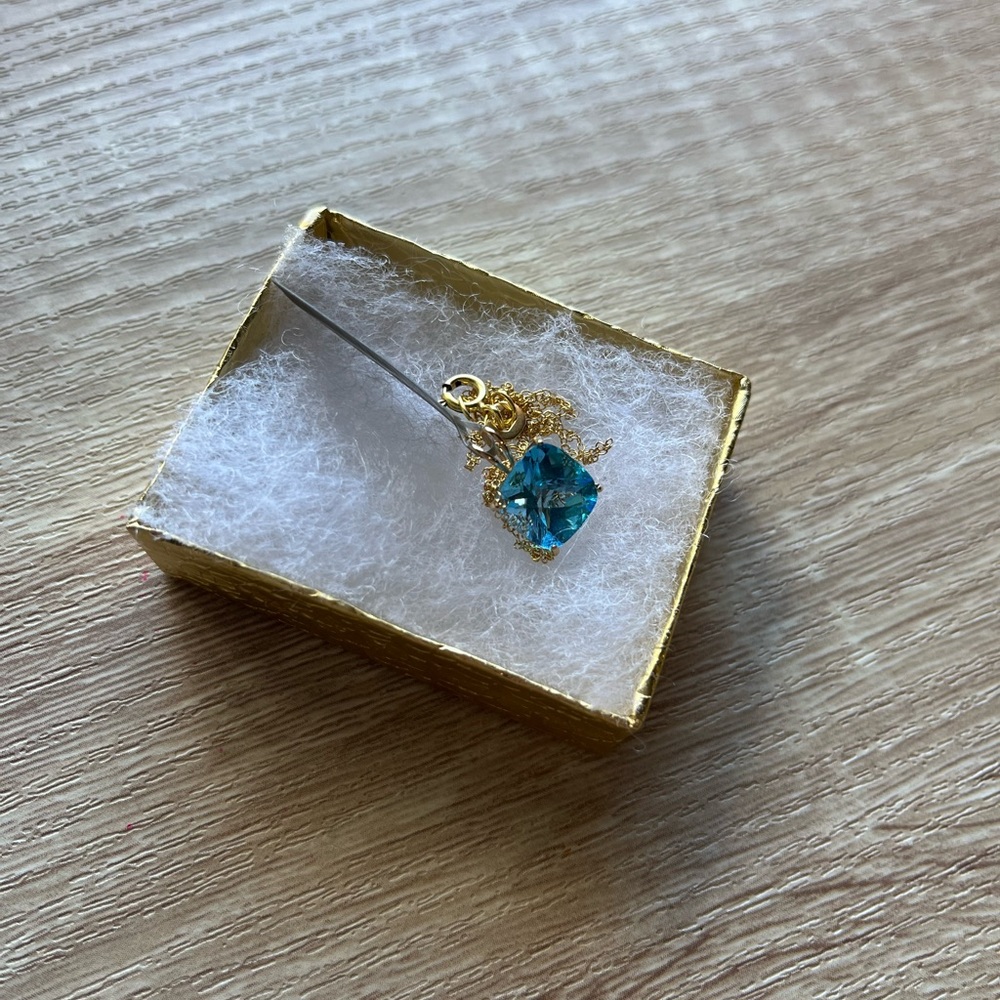 14k YG Genuine Blue Topaz.